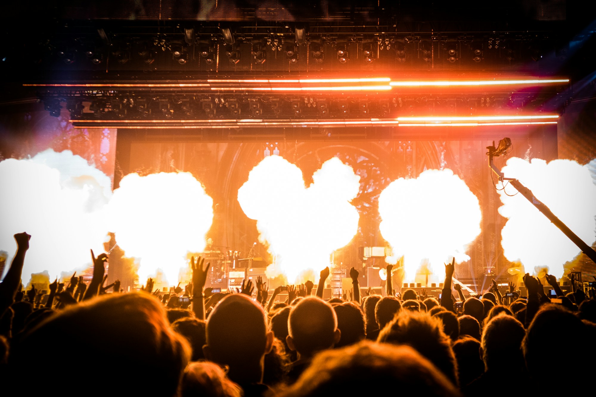 Independent musician performing live under stage lights
