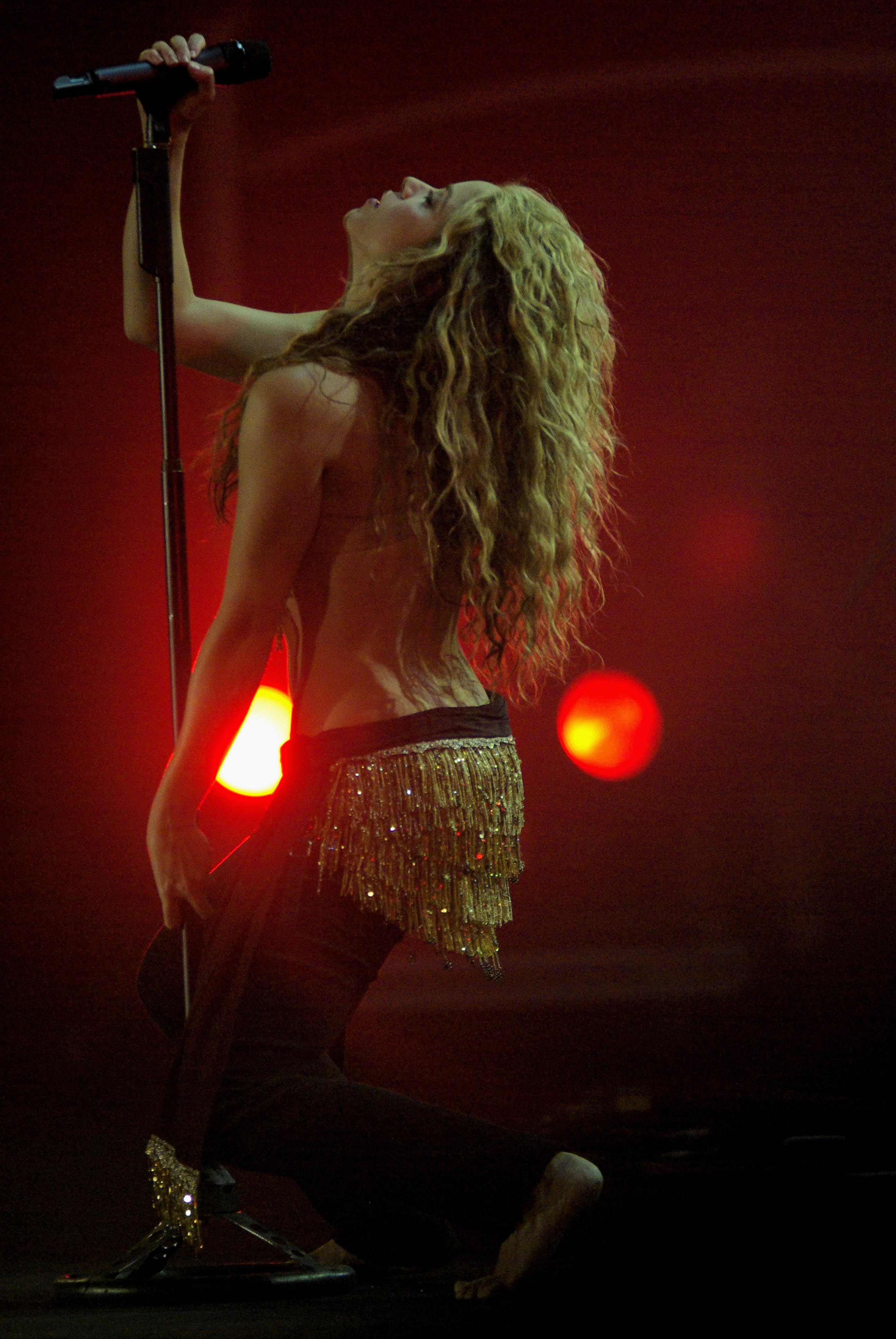 Shakira performing live on stage