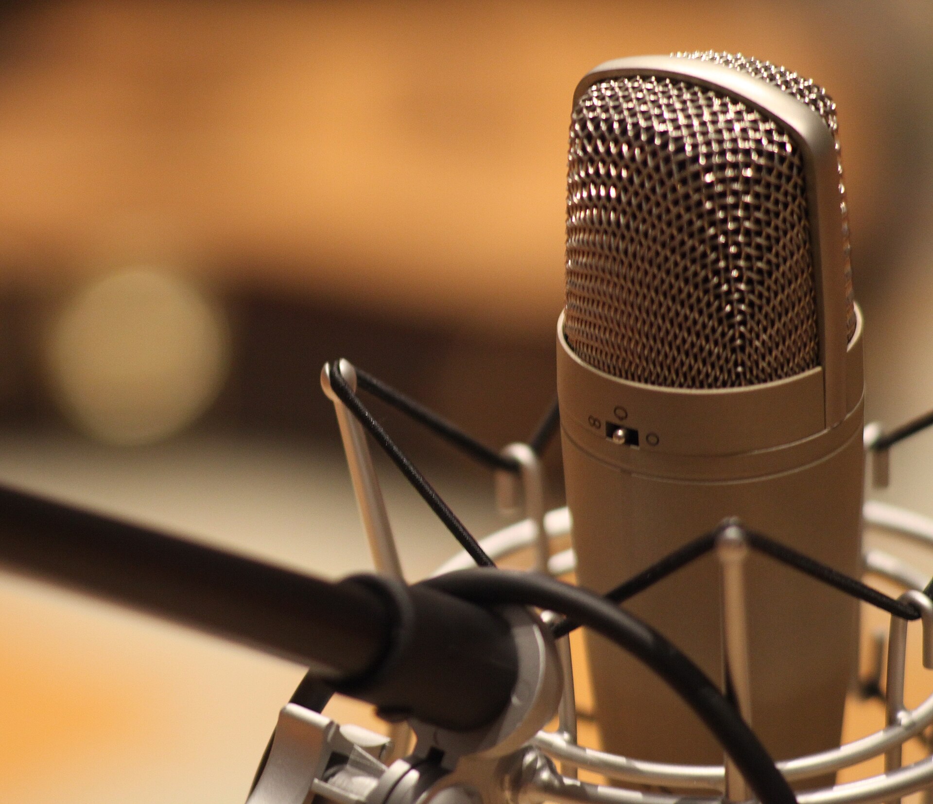 Studio microphone set up for recording and playlist curation
